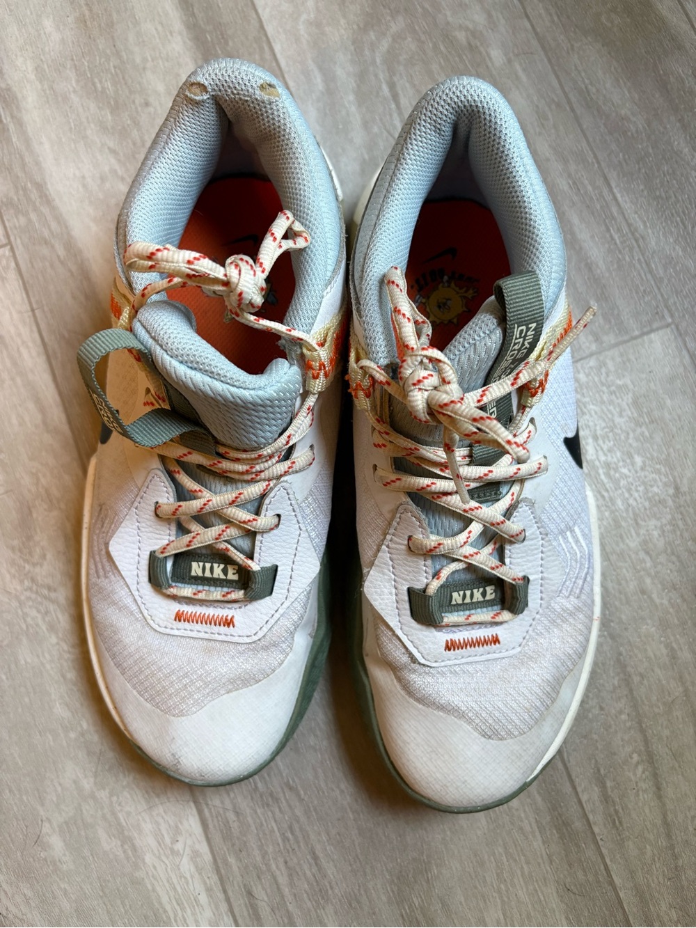 Nike Kids White and Orange Athletic Sneakers with Olive Accents